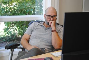 a man checking an epc on his computer